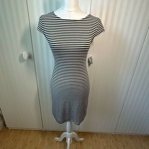 Unedited gray and white striped stretch fitted cross back dress Size M